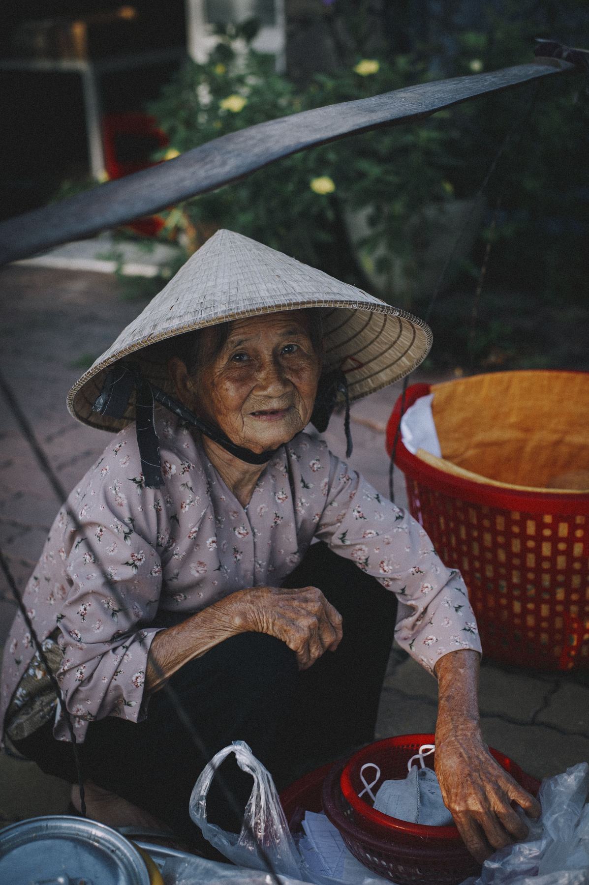 An elderly woman smiling warmly